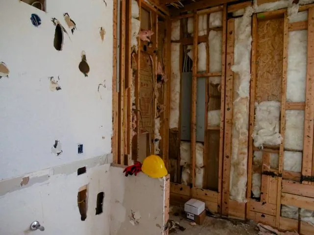 Interior wall opened to the studs during storm damage repairs